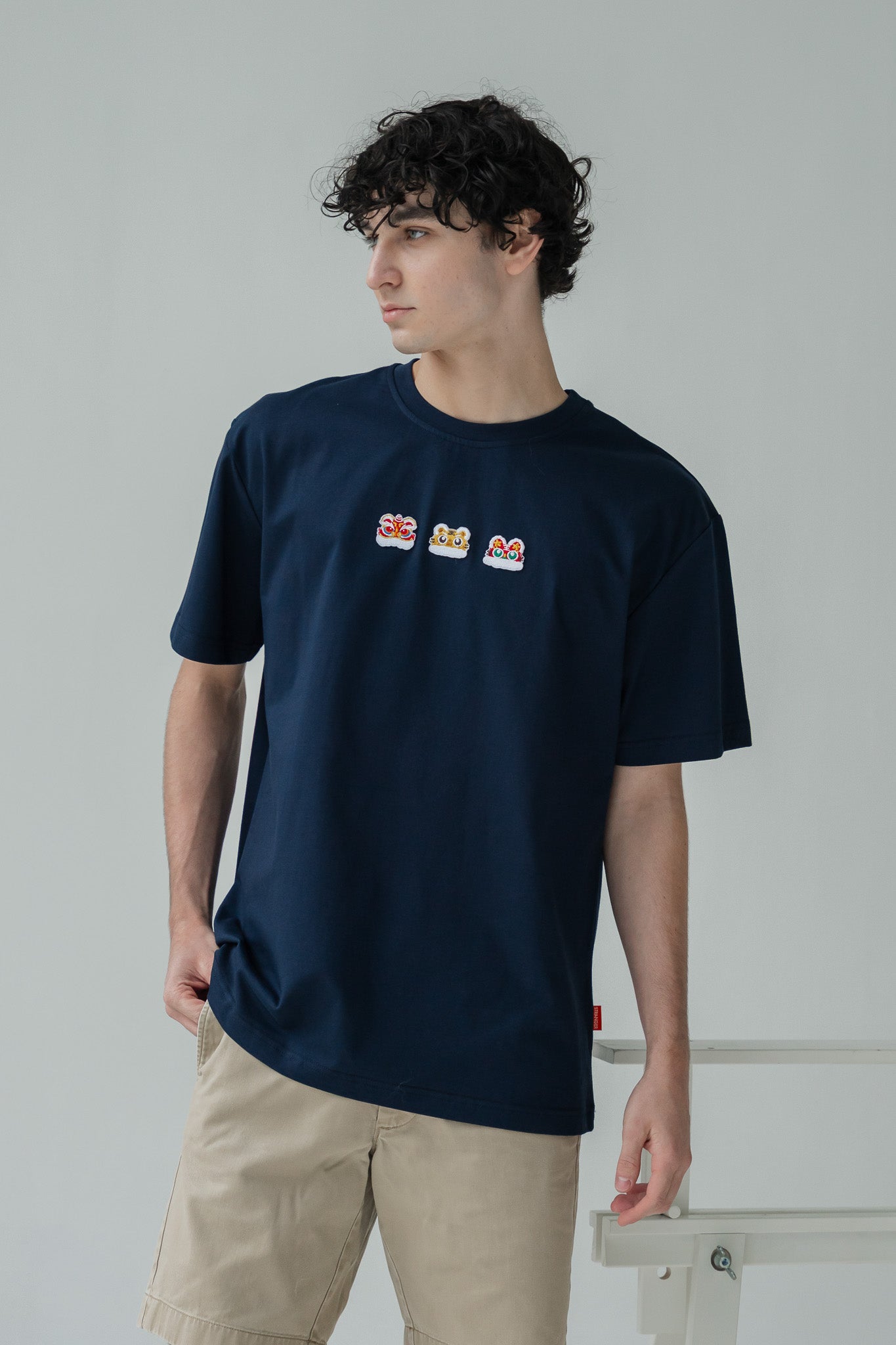 Lucky Lion Men's Tee in Navy