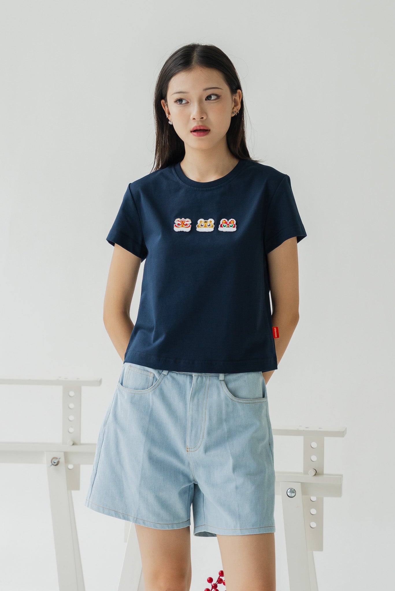 Lucky Lion Women's Tee in Navy