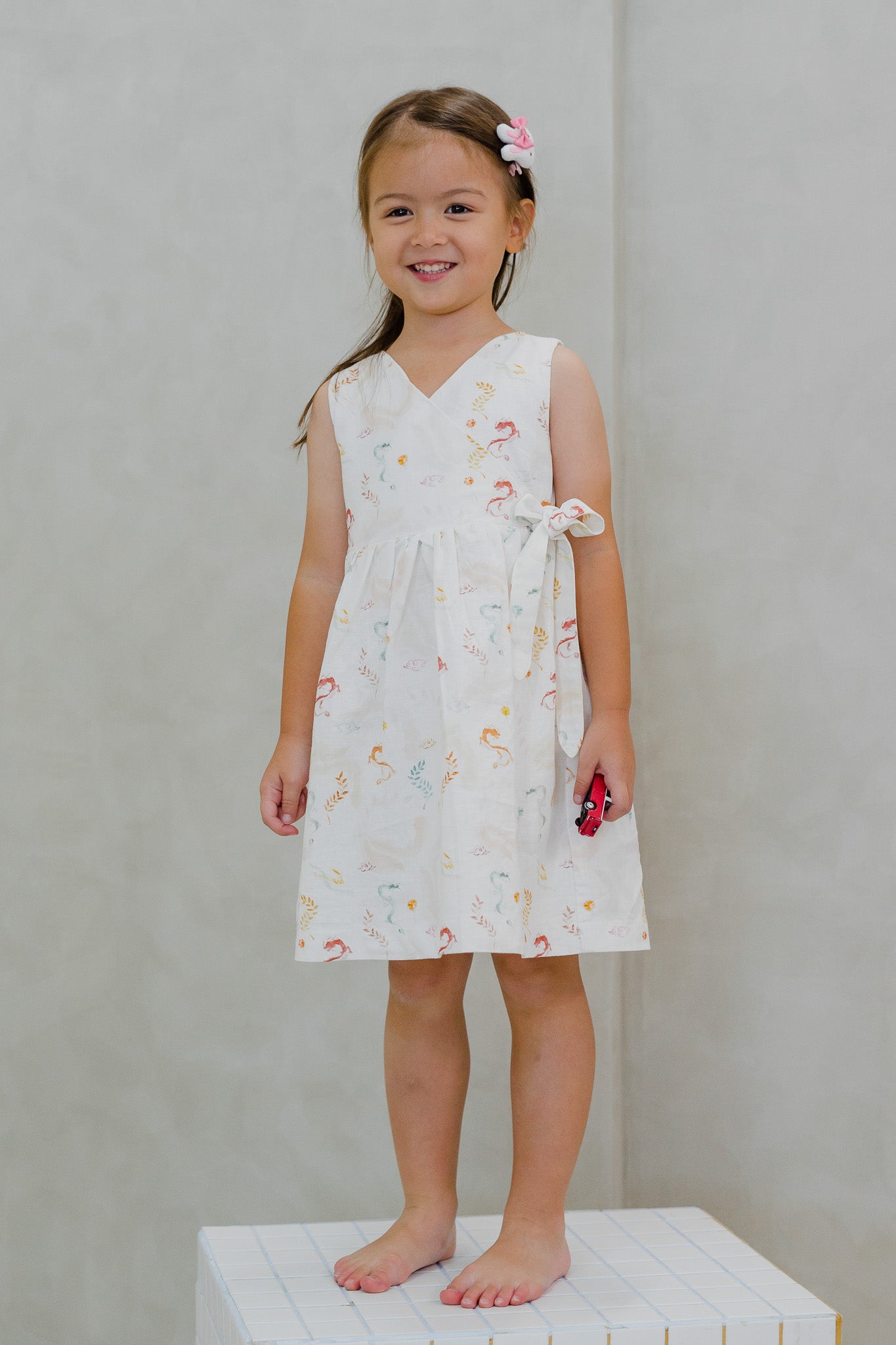 Winds Of Fortune Kid's Linen Wrap Dress in Joy