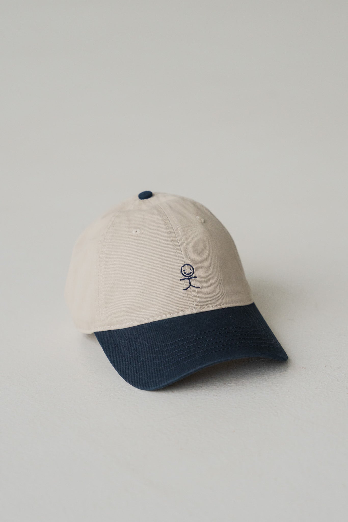 Smiley Logo Colour Block Canvas Cap in Navy