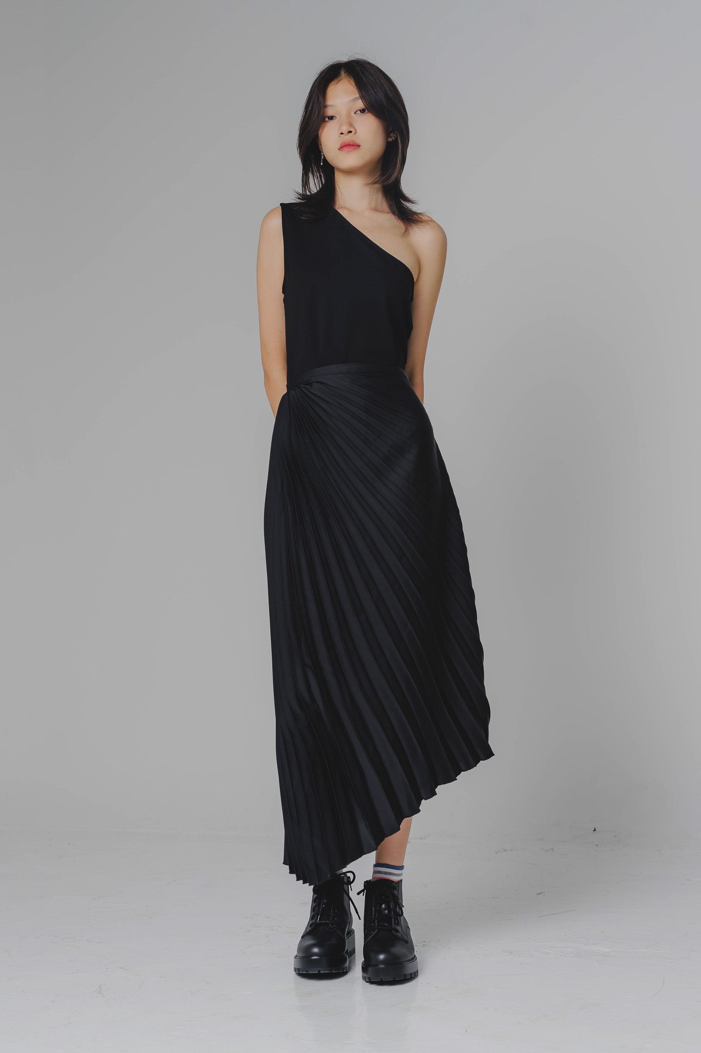 Asymmetrical Pleated Skirt in Black
